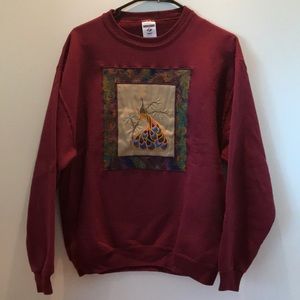 Jerzees medium sweatshirt with embroidered peacock on front. Like new condition